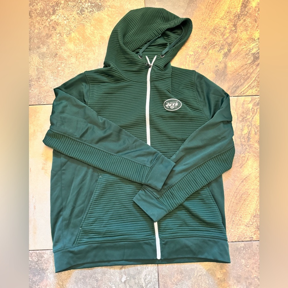 New York Jets zip-up hoodie.